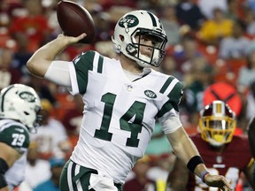 FILE - In this Aug. 16, 2018, file photo, New York Jets quarterback Sam Darnold (14) throws against the Washington Redskins during the first half of a preseason NFL football game, in Landover, Md. The Jets traded up three spots to get to No. 3 in the draft, hoping to get a potential franchise quarterback. After Cleveland took Baker Mayfield and the Giants went with running back Saquon Barkley, Sam Darnold fell right into New York's lap _ getting the guy it wanted all along.