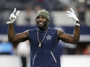 FILE - In this Nov. 5, 2017, file photo, Dallas Cowboys wide receiver Dez Bryant (88) warms up before an NFL football game against the Kansas City Chiefs, in Arlington, Texas. Dez Bryant has dropped in to meet the Browns. The three-time Pro Bowl wide receiver arrived at the team's headquarters on Thursday, Aug. 16, 2018, a visit that could lead to Bryant signing with Cleveland. Bryant posted a photo on Twitter of him signing autographs at Cleveland's airport.