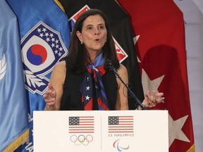 FILE - In this Aug. 1, 2017, file photo, U.S. Olympic Committee chief marketing officer Lisa Baird speaks about the Team USA WinterFest for the upcoming 2018 Pyeongchang Winter Olympic Games, at Yongsan Garrison, a U.S. military base in Seoul, South Korea. The longtime chief marketing officer of the U.S. Olympic Committee U.S. Olympic Committee is taking a similar position at New York Public Radio. Lisa Baird spent nine years with the USOC. She reimagined the organization's branding, cutting deals with United Airlines, Hershey, Nike, Polo and others. The value of the deals she brokered were estimated at $1 billion.