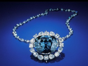 This undated photo made available by the Smithsonian Institution shows the Hope Diamond. Blue diamonds are the rarest of all, but how they formed billions of years ago is a mystery. Now, scientists who scrutinized dozens of them conclude that they originated deeper than more common ones.