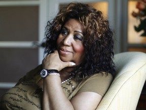 FILE - In this July 26, 2010 file photo Aretha Franklin poses for a portrait in Philadelphia. On Thursday, Aug. 16, 2018, Franklin died from pancreatic cancer at her home in Detroit. She was 76.