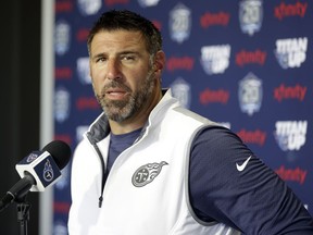 FILE - In this July 27, 2018, file photo, Tennessee Titans head coach Mike Vrabel answers questions during a news conference after a practice at NFL football training camp in Nashville, Tenn. The NFL tapped Vrabel to narrate a video detailing the new lowering the head to initiate contact rule, hoping the man who played 14 years as a linebacker in the league could more easily explain how players should adapt.