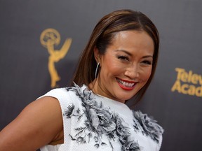FILE - In this Sept. 11, 2016, file photo, Carrie Ann Inaba arrives at night two of the Creative Arts Emmy Awards at the Microsoft Theater in Los Angeles. Inaba and television personality Ross Matthews will co-host this year's Miss America competition. Pageant officials made the announcement Wednesday, Aug. 29.