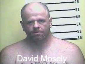 This undated photo provided by the Kentucky State Police shows David Mosely. Police in Kentucky said Mosely and Matthew Price escaped Tuesday, Aug. 21, 2018, from the Bell County jail, spraying bleach in the eyes of one jail worker and assaulting another, and they are still on the loose. (Kentucky State Police via AP)