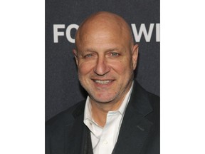 FILE - In this April 5, 2016, file photo, Tom Colicchio attends the Food & Wine 2016 Best New Chefs Party at Event Block in New York. Police are investigating after political and religious symbols were painted on "Top Chef" producer and restaurateur Colicchio's home and lawn on Long Island. Colicchio and his wife, Lori Silverbush, tweeted they discovered the graffiti on Tuesday, Aug. 21, 2018.