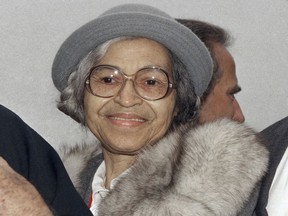FILE - This Oct. 28, 1986, file photo shows Rosa Parks at Ellis Island in New York. A letter written by Parks describing the 1957 bombing of neighbors' home has been purchased at auction by the couple who were targeted in the attack. Alabama State University announced that the Rev. Robert Graetz and his wife Jeannie purchased the letter by Parks describing the bombing of their home. (AP Photo/File)