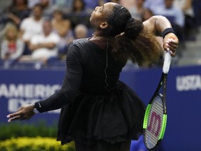 Serena Williams serves to Venus Williams during the third round of the U.S. Open tennis tournament Friday, Aug. 31, 2018, in New York. Serena Williams won 6-1, 6-2.
