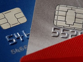 FILE - This June 10, 2015, file photo shows credit cards in Philadelphia. On Tuesday, Aug. 7, 2018, the Federal Reserve releases its June report on consumer borrowing.