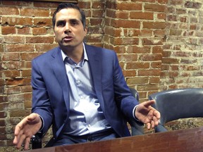FILE - In this Jan. 25, 2018, file photo, Kansas City-area businessman Greg Orman discusses his run for Kansas governor as an independent candidate during an interview in Topeka, Kan. Democrats horrified by the thought that provocative conservative Kris Kobach could be Kansas' next governor are attacking Orman, a Kansas City-area businessman running as an independent. Orman's candidacy could thwart Democrats' ambitions and help elect the Republican. Democrats have launched a legal challenge aimed at removing Orman from the November ballot, and a state board plans to consider it Thursday, Aug. 23.