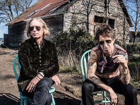 This undated mage released by New West Records shows Peter Buck, left, and Joseph Arthur who released a collaboration album "Arthur Buck."