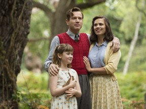 This image released by Disney shows, from left, Bronte Carmichael, Ewan McGregor and Hayley Atwell in a scene from "Christopher Robin."