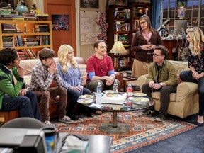 This image released by CBS shows Kunal Nayyar,  from left, Simon Helberg, Melissa Rauch, Jim Parsons, Mayim Bialik, Johnny Galecki and Kaley Cuoco appear in a scene from the long-running comedy series "The Big Bang Theory." The popular series will end in 2019.
