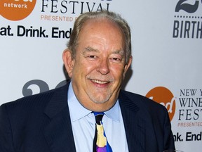 FILE - In this Oct. 17, 2013 file photo, Robin Leach attends the Food Network's 20th birthday party in New York.  Leach, whose voice crystalized the opulent 1980s on TV's "Lifestyles of the Rich and Famous," has died, Friday, Aug. 24, 2018.