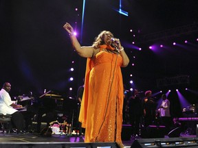 FILE - In this July 8, 2012 file photo, Aretha Franklin performs at the Essence Music Festival in New Orleans. Franklin died Thursday, Aug. 16, 2018 at her home in Detroit.  She was 76.