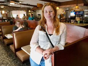 FILE - In this May 2, 2018, file photo, Diane Neal poses at a diner during an interview in Kingston, N.Y., discussing her campaign for the 19th congressional district. It looks like curtains for "Law and Order" actress Neal in her bid for a new role as congresswoman from a sprawling upstate New York district. Neal tells the Times Herald-Record Friday, Aug. 24, she's confident she'll succeed in appealing the decision to the state Supreme Court.