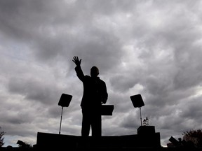 FILE - In this Oct. 18, 2008, file photo, Republican presidential candidate Sen. John McCain, R-Ariz., waves to the crowd at a campaign rally in Woodbridge, Va. Aide says senator, war hero and GOP presidential candidate McCain died Saturday, Aug. 25, 2018. He was 81.