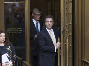 Michael Cohen, former lawyer to President Donald Trump, departs following his appearance in Federal Court on Tuesday, Aug. 21, 2018, in New York. Cohen, has pleaded guilty to charges including campaign finance fraud stemming from hush money payments to porn actress Stormy Daniels and ex-Playboy model Karen McDougal.
