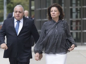 Neusa Marin, wife of Jose Maria Marin, leaves Brooklyn federal court with attorney Paulo Peixoto, Wednesday, Aug. 22, 2018, in New York. Jose Maria Marin, the former South American soccer official, has been sentenced to four years in prison for his conviction on corruption charges in the sprawling FIFA bribery scandal.