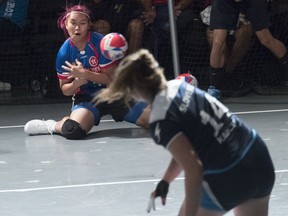 A Hong Kong player is hit by the ball during women's competition against Slovenia in the Dodgeball World Cup, Saturday, Aug. 4, 2018, in New York.