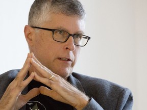 In this Aug. 7, 2018, photo Impossible Foods CEO Pat Brown is interviewed in New York. As companies try to cater to Americans' interest in lighter eating, the term "plant-based" is replacing "vegan" and "vegetarian" on some foods. The worry is that the v-words might have unappetizing or polarizing associations.  Impossible Foods, which makes a meatless patty that's supposed to taste like meat, even warns restaurants not to use those words when describing its burger on menus.