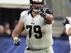 FILE - In this Dec. 11, 2016 file photo Los Angeles Rams offensive tackle Rob Havenstein (79) points to a player during the first half of an NFL football game against the Atlanta Falcons in Los Angeles. Havenstein on Monday, Aug. 20, 2018 agreed to terms of a four-year contract extension through the 2022 season.