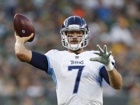FILE - In this Aug. 9, 2018 file photo Tennessee Titans' Blaine Gabbert throws during the first half of a preseason NFL football game against the Green Bay Packers in Green Bay, Wis. Gabbert quickly stopped the reporter asking the quarterback about learning his fourth offense in four years. The Titans, who signed Gabbert in March to back up Marcus Mariota, are just the fourth team that the quarterback has played for since being drafted by Jacksonville in 2011. But coach Mike Vrabel is the eight different head coach and yes, the eighth different scheme that Gabbert has had to learn since coming into the NFL from Missouri.