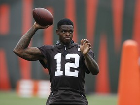 Cleveland Browns wide receiver Josh Gordon warms up during the team's organized team activity at its NFL football training facility Tuesday, June 5, 2018, in Berea, Ohio. Gordon has "humbly" returned to the team after an extended absence to deal with his health. The former Pro Bowler has missed most of the past five seasons for numerous violations of the NFL's substance abuse policy. He has battled addictions to drugs and alcohol. Gordon was in rehab last year while suspended.