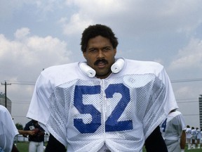 In this undated file photo Robert Brazile, linebacker for the Houston Oilers, poses for a photo. Though Brazile turned in his Dr. Doom persona decades ago for the role of Mr. Brazile, a special education teacher, he'll revisit the success of his first career on Saturday, Aug. 4, 2018 when he'll be one of eight men inducted into the Pro Football Hall of Fame. Brazile is part of a class which includes Bobby Beathard, Brian Dawkins, Jerry Kramer, Ray Lewis, Randy Moss, Brian Urlacher and Terrell Owens. (AP Photo, file)