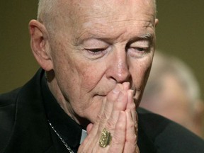 In this Nov. 14, 2011 file photo, Cardinal Theodore McCarrick prays during the United States Conference of Catholic Bishops' annual fall assembly in Baltimore.