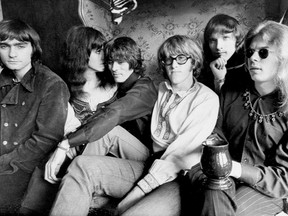 FILE - This Dec. 5, 1968 file photo shows the rock band Jefferson Airplane as they pose in their Pacific Heights, San Francisco apartment. They are, from left: Marty Balin, Grace Slick, Spencer Dryden, Paul Kantner, Jorma Kaukonen and Jack Casady. A lawsuit filed by Balin, 77, filed against Mount Sinai Beth Israel hospital says the singer and guitarist lost part of his tongue and has a paralyzed vocal cord because of the procedure done after he was hospitalized for an emergency heart surgery in 2016. Lawyers for Balin filed the suit on Thursday, Aug. 16, 2018, in federal court in Manhattan, seeking unspecified damages. (AP Photo, File)