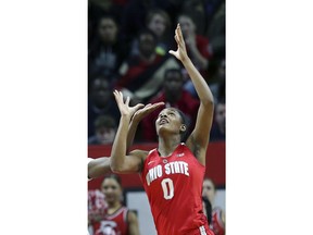 FILE - In this Feb. 26, 2017, file photo, then-Ohio State forward Tori McCoy battles for the ball against Rutgers during the first half of an NCAA college basketball game, in Piscataway, N.J. Tori McCoy hates having to watch Marquette practice from the sideline. For now, the Ohio State transfer must concentrate on her health. The junior forward needs a kidney transplant after being diagnosed with a rare disease.