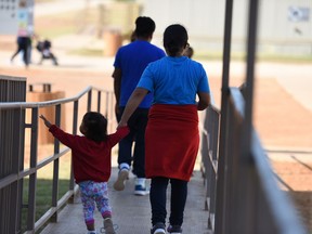 This Thursday, Aug. 9, 2018, photo, provided by U.S. Immigration and Customs Enforcement, shows a scene from a tour of South Texas Family Residential Center in Dilley, Texas. Currently housing 1,520 mothers and their children, about 10 percent are families who were temporarily separated and then reunited under a "zero tolerance policy" that has since been reversed.