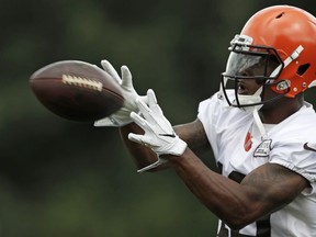 FILE - In this Friday, July 27, 2018, file photo, Cleveland Browns wide receiver Corey Coleman catches a pass during NFL football training camp, in Berea, Ohio. On Sunday, Aug. 5, 2018, a person familiar with the negotiations says the Cleveland Browns have agreed to trade disappointing wide receiver Corey Coleman to the Buffalo Bills for a draft pick.