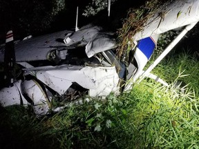 This photo provided by the Maine State Police shows a U.S. Customs and Border Protection airplane  after it crash-landed late Wednesday in Burnham, Maine, near the Pittsfield Municipal Airport. Officials say the two crew members, who were conducting border security operations, were injured but were able to walk away from the crash. (Maine State Police via AP)