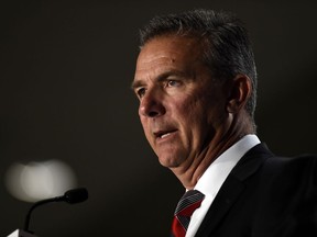 File-This July 24, 2018, file photo shows Ohio State head coach Urban Meyer speaking at the Big Ten Conference NCAA college football Media Days in Chicago. The Big Ten East has been called the toughest division in college football, and that's expected to be the case again this season even with the uncertainty surrounding Meyer and his defending conference champion Ohio State Buckeyes.