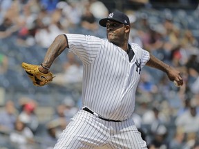 New York Yankees starting pitcher CC Sabathia throws during the first inning of a baseball game against the Texas Rangers at Yankee Stadium Sunday, Aug. 12, 2018, in New York.