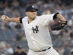 New York Yankees pitcher Lance Lynn delivers the ball to the Chicago White Sox during the first inning of a baseball game Tuesday, Aug. 28, 2018, at Yankee Stadium in New York.