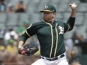 Oakland Athletics pitcher Brett Anderson throws against the Seattle Mariners during the second inning of a baseball game in Oakland, Calif., Wednesday, Aug. 15, 2018.