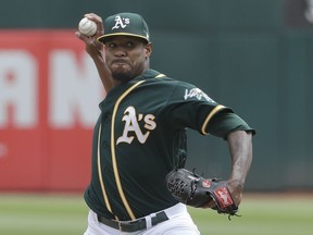 Oakland Athletics pitcher Edwin Jackson throws against the Texas Rangers during the first inning of a baseball game in Oakland, Calif., Wednesday, Aug. 22, 2018.