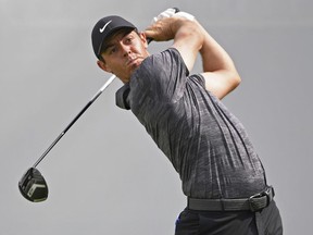 Rory McIlroy, from Northern Ireland, follows his tee shot on the 10th hole during the first round of the Bridgestone Invitational golf tournament at Firestone Country Club, Thursday, Aug. 2, 2018, in Akron, Ohio.