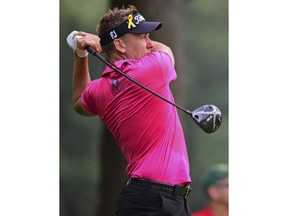Ian Poulter, from England, watches his tee shot on the second hole during the second round of the Bridgestone Invitational golf tournament at Firestone Country Club, Friday, Aug. 3, 2018, in Akron, Ohio.