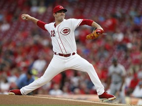 Cincinnati Reds starting pitcher Matt Harvey throws to a San Francisco Giants batter during the first inning of a baseball game Saturday, Aug. 18, 2018, in Cincinnati.