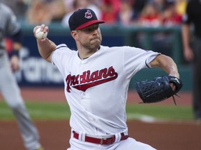 Cleveland Indians starting pitcher Corey Kluber delivers to a Tampa Bay Rays batter during the first inning of a baseball game in Cleveland, Friday, Aug. 31, 2018.