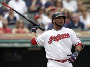 Cleveland Indians' Edwin Encarnacion reacts after striking out against Minnesota Twins starting pitcher Jose Berrios in the fourth inning of a baseball game, Thursday, Aug. 9, 2018, in Cleveland.