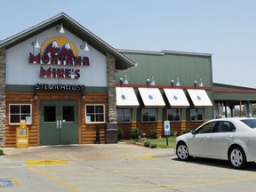 FILE - This undated file photo shows Montana Mike's Steakhouse in Clinton, Okla. A second federal lawsuit has been filed against Walter and Carolyn Schumacher and businesses they operate, alleging luring immigrants to the U.S. on work visas then paying substandard wages. Labor Department spokesman Juan Rodriguez said the department is investigating two of the Schumacher's companies where some of the immigrants worked, Hotelmacher, LLC, which operates a Holiday Inn Express, and Steakmacher, LLC, which does business as Montana Mike's Steakhouse, but declined further comment.