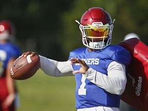 FILE - In this Monday, Aug. 6, 2018, file photo, Oklahoma quarterback Kyler Murray (1) throws during an NCAA college football practice in Norman, Okla. Murray has been picked as Oklahoma's starting quarterback.