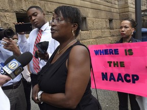 Carmen Ashley, great aunt of Antwon Rose Jr. talks with reporters outside of the courthouse following a hearing for East Pittsburgh police officer Michael Rosfeld on Wednesday, Aug. 22, 2018, in Pittsburgh.  Rosfeld is charged in the June 19 shooting death of Rose, an unarmed teenager as he fled a traffic stop.