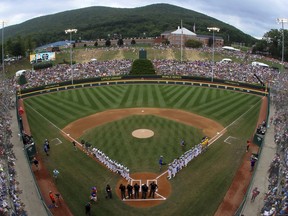 Honolulu, Hawaii, lines the first baseline and South Korea lines the third baseline as the teams are introduced before the Little League World Series Championship baseball game at Lamade Stadium in South Williamsport, Pa., Sunday, Aug. 26, 2018.