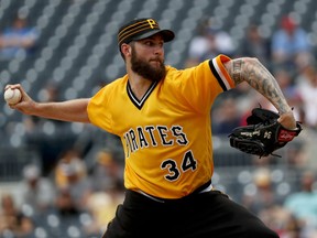 Pittsburgh Pirates starter Trevor Williams pitches against the St. Louis Cardinals in the first inning of a baseball game, Sunday, Aug. 5, 2018, in Pittsburgh.