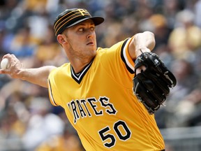 Pittsburgh Pirates starter Jameson Taillon pitches against the Chicago Cubs in the first inning of a baseball game, Sunday, Aug. 19, 2018, in Pittsburgh.